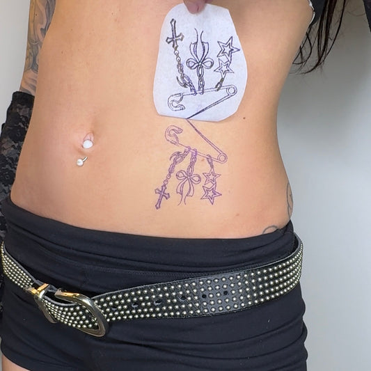 safe pin with charms